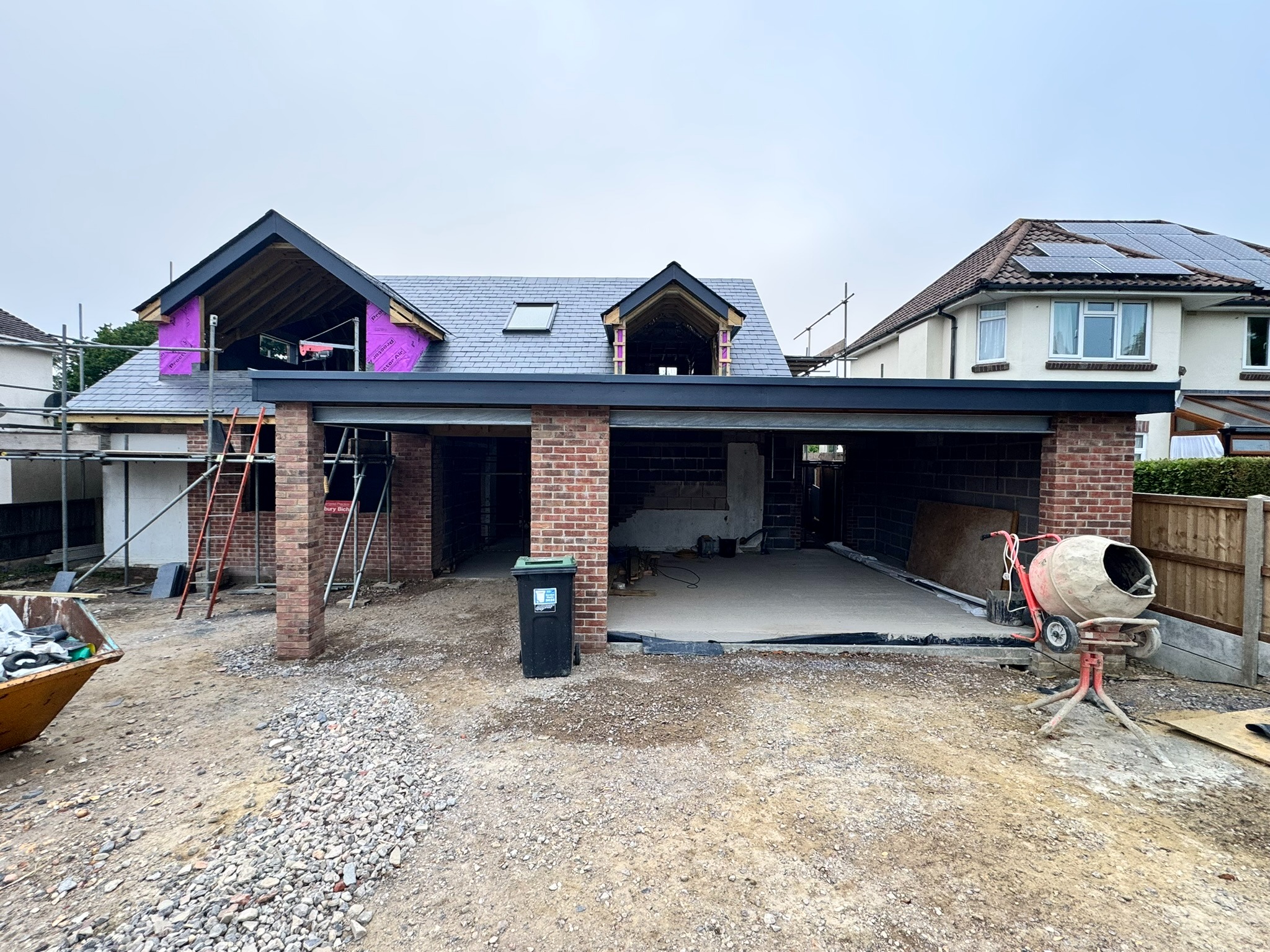 Corfe Way roof showing flat and pitched roof interfaces during construction